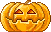 a jack-o-lantern smilie with a sparkling toothy grin